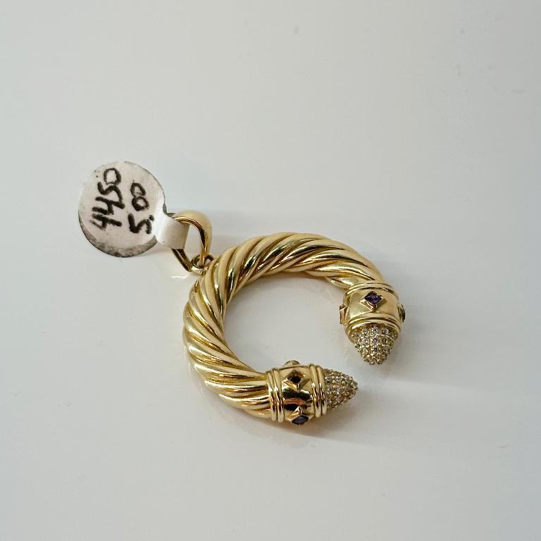 Dije con serpiente